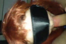 Naughty redhead lady gets her mouth drilled by an anonymous stranger wearing a ...